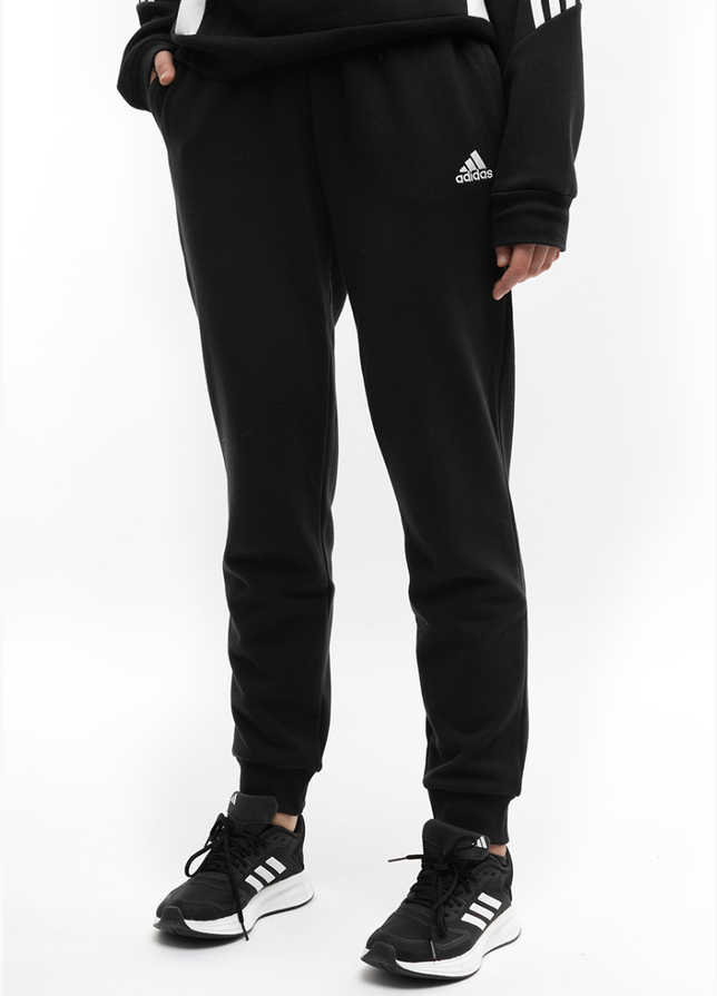 adidas Spodnie damskie Essentials Linear French Terry Cuffed IC6868 adidas Spodnie damskie Essentials Linear French Terry Cuffed IC6868